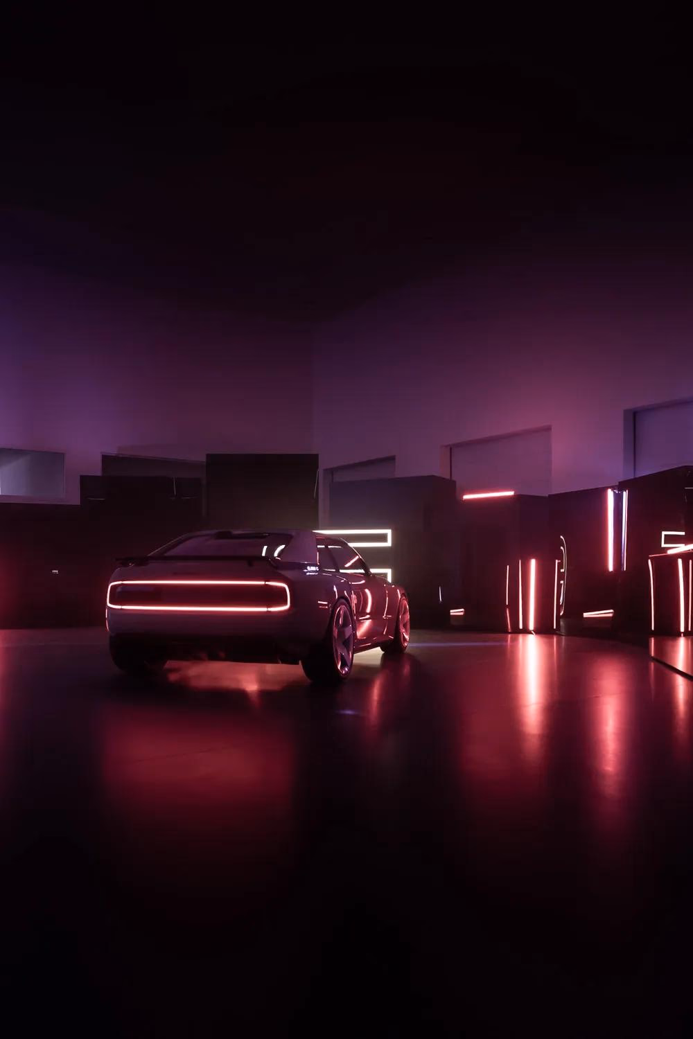 E-Legend: Silhouettierter Sportwagen mit pinken Neonlichtern in dunkler Halle